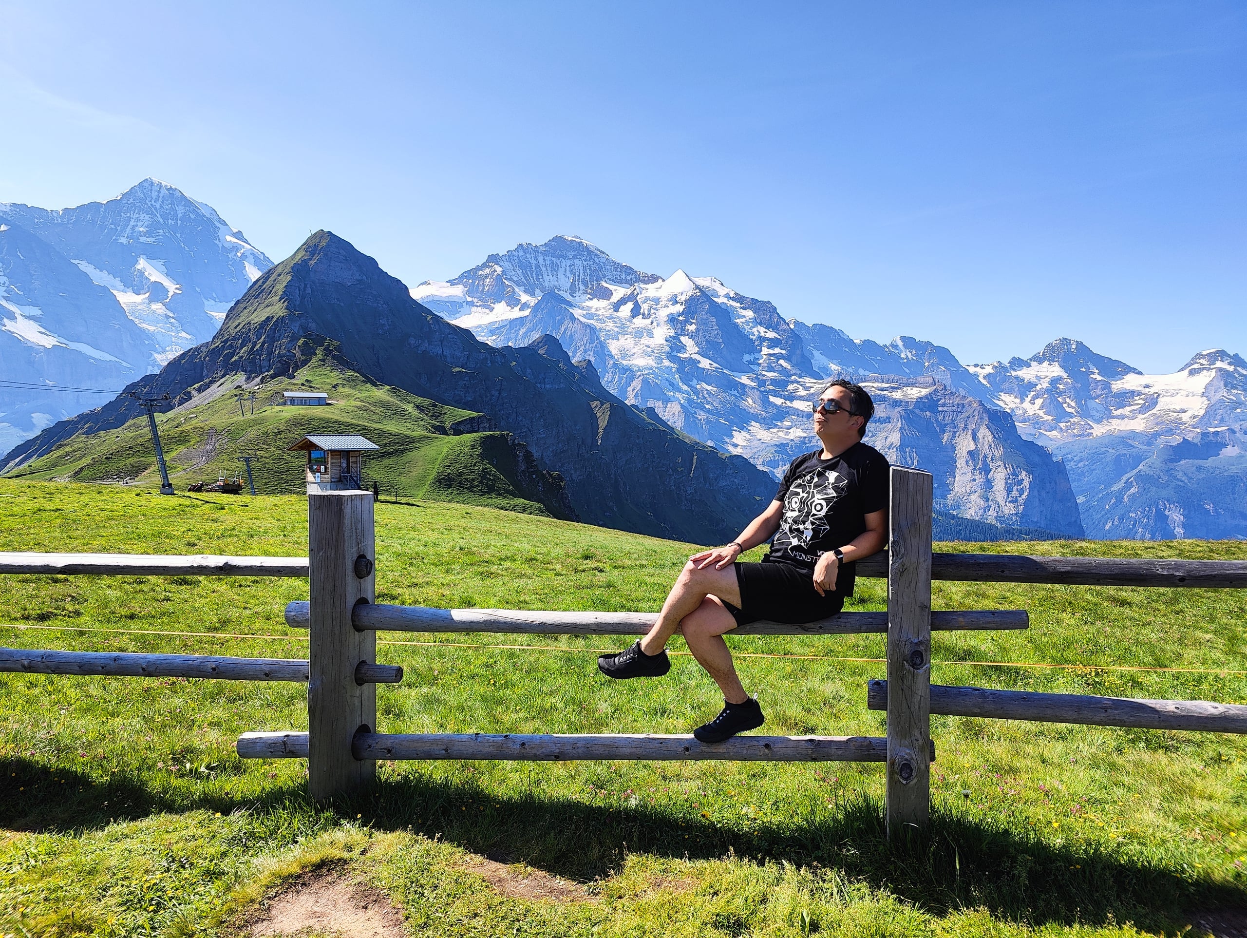 Swiss Alps landscape with mountain peaks and serene lake
